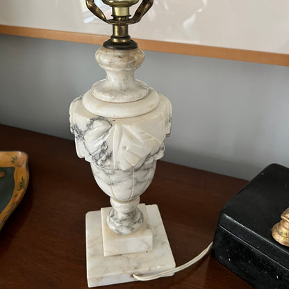 Marble lamp with decorative design on a wooden surface