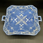 blue and white tray on gray background
