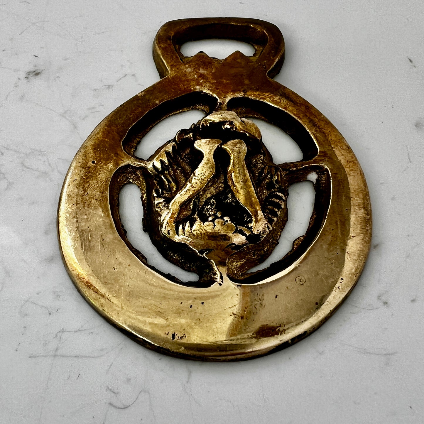 Vintage brass love birds medallion keychain with leather loop and brass key ring.