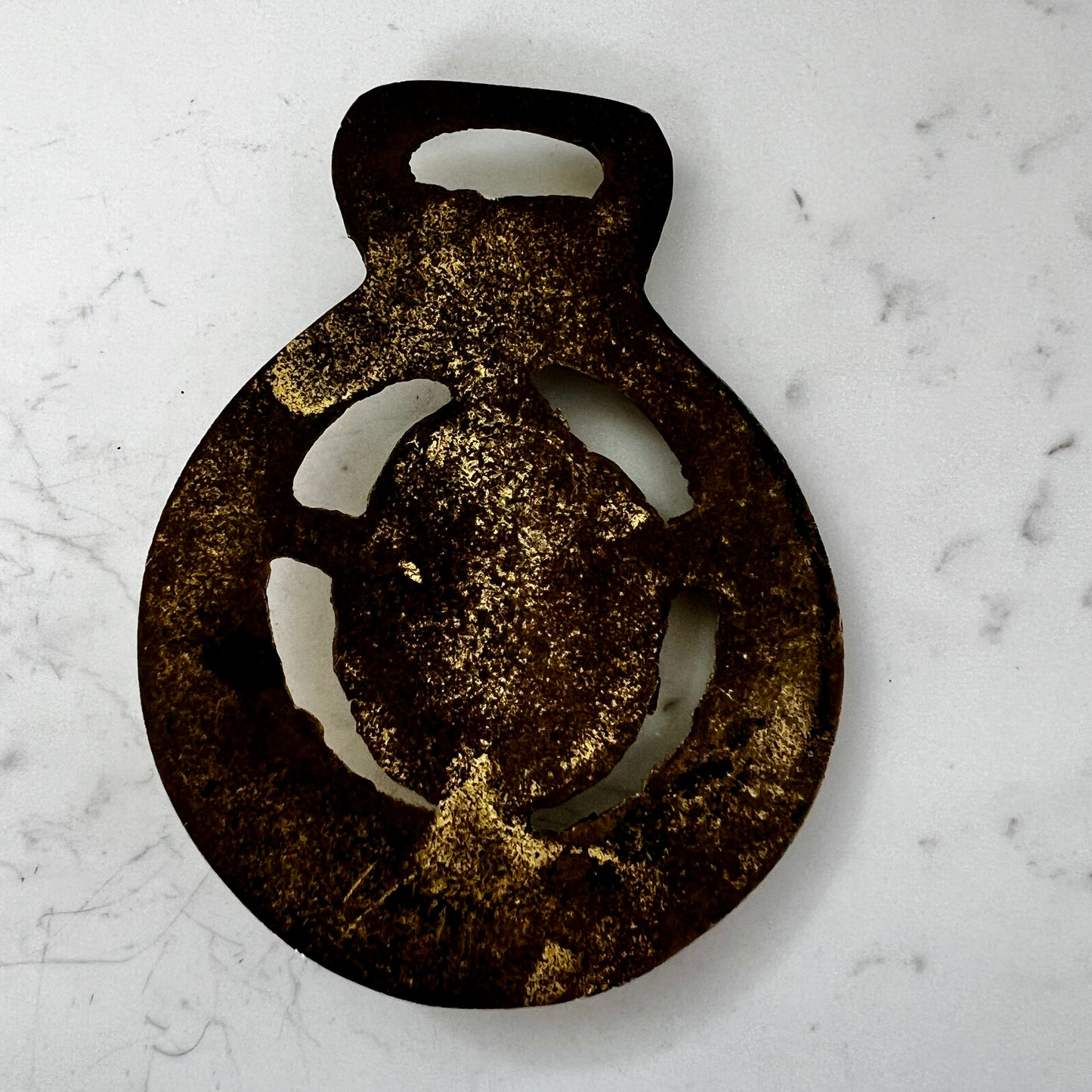 Back of Vintage brass love birds medallion 