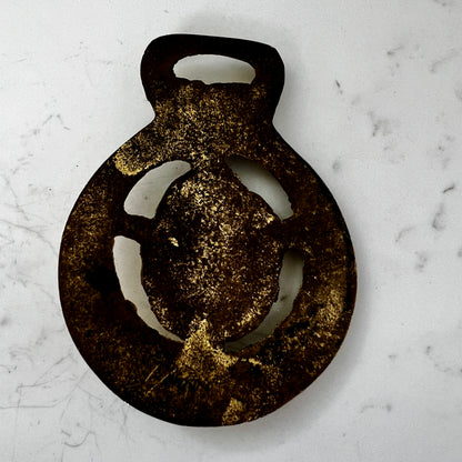 Back of Vintage brass love birds medallion 