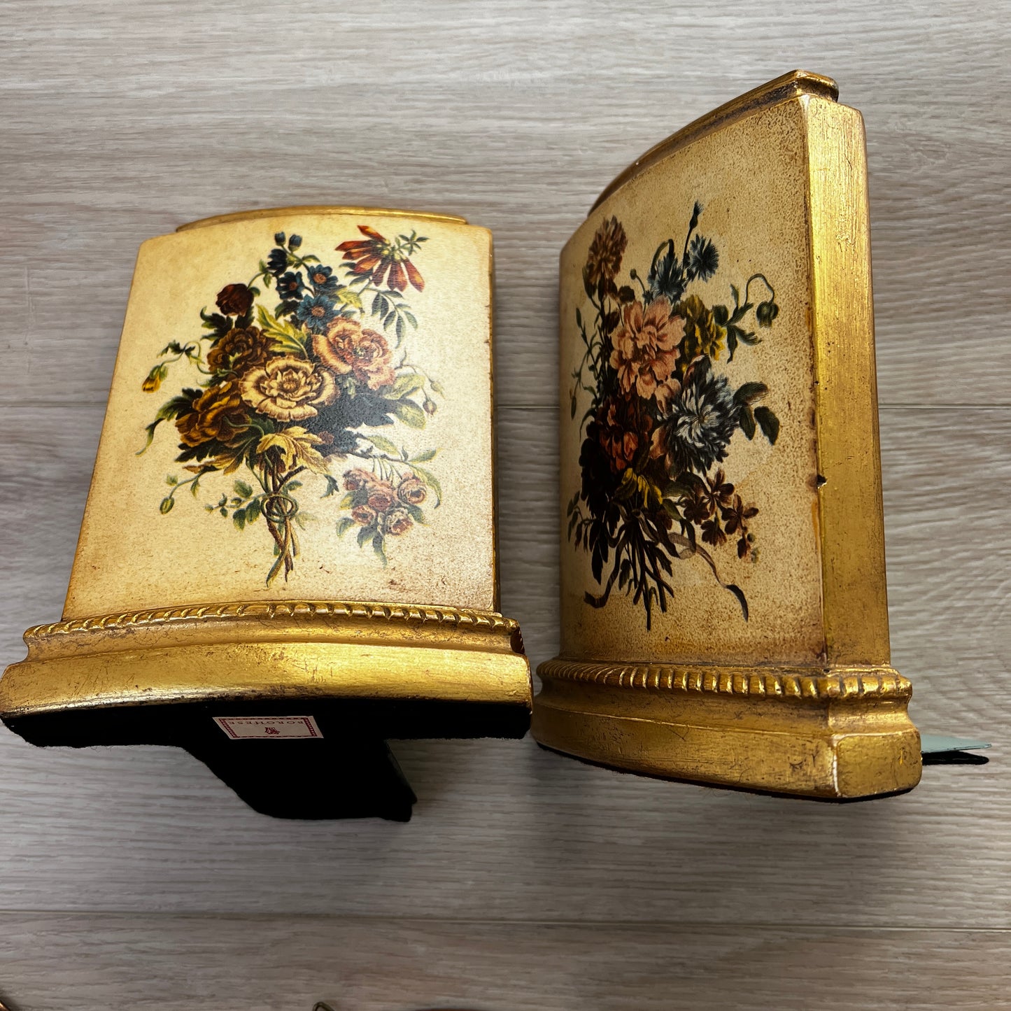Pair of vintage MCM Borghese floral gold bookends with raised flower design for styled shelves or mid century décor.