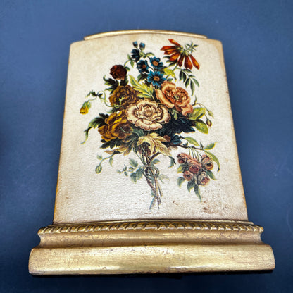 Pair of vintage MCM Borghese floral gold bookends with raised flower design for styled shelves or mid century décor.
