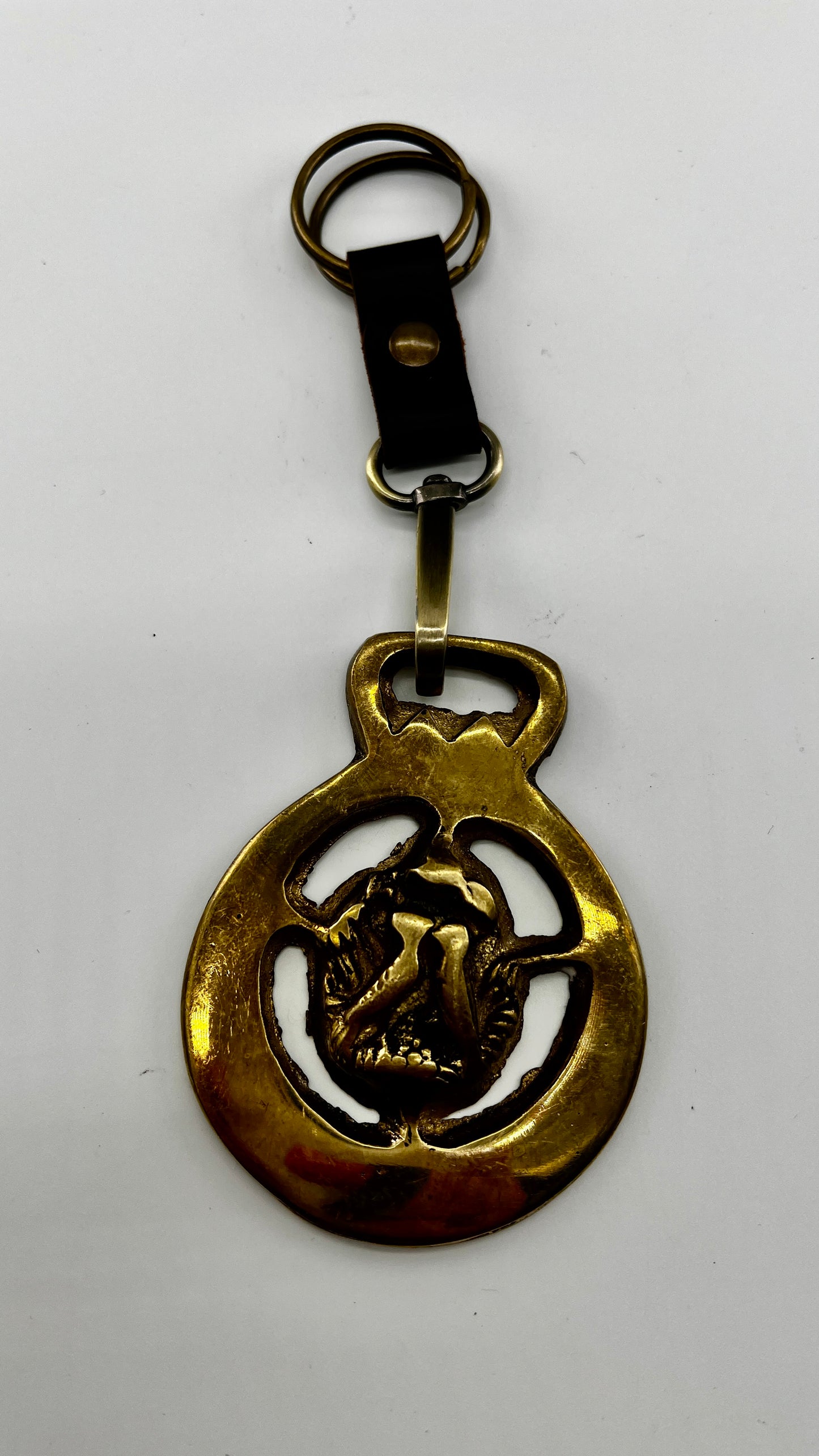 Vintage brass love birds medallion keychain with leather loop and brass key ring.