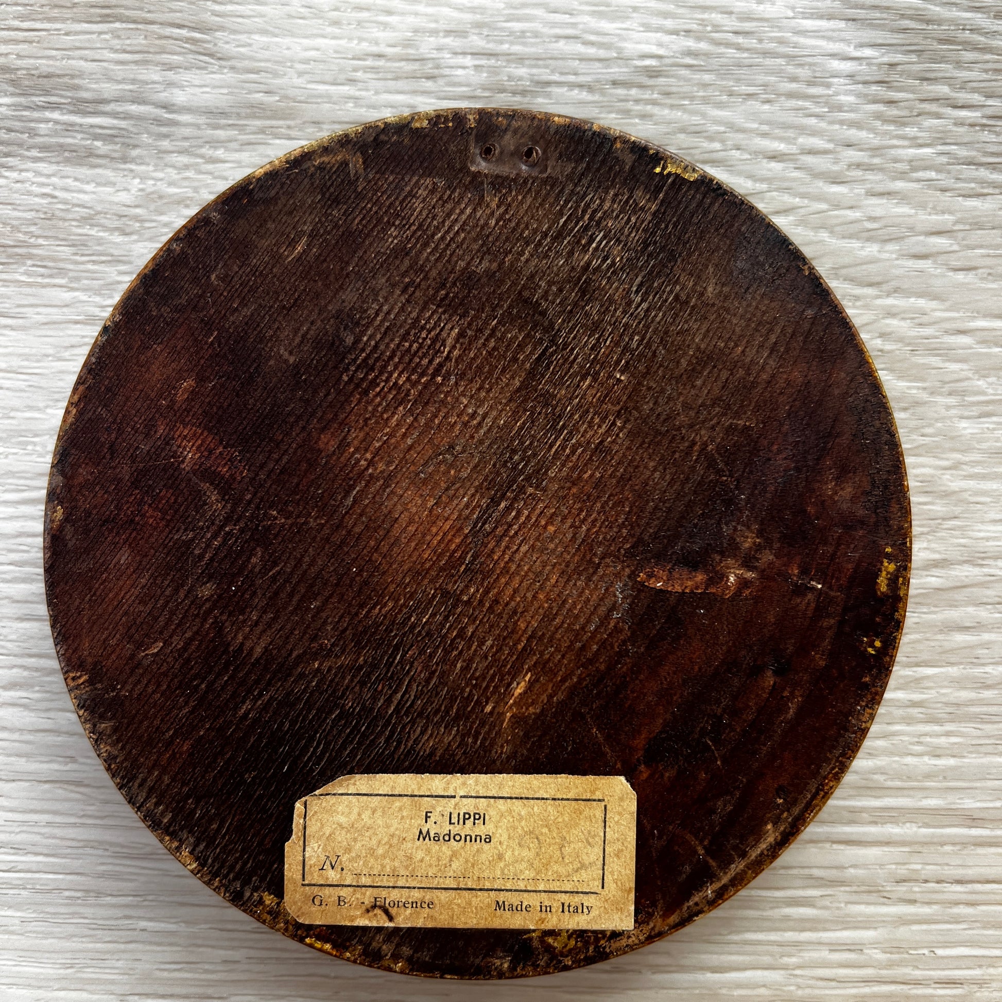 Back of vintage Florentine giltwood frame showing Italian origin and missing hanging hardware