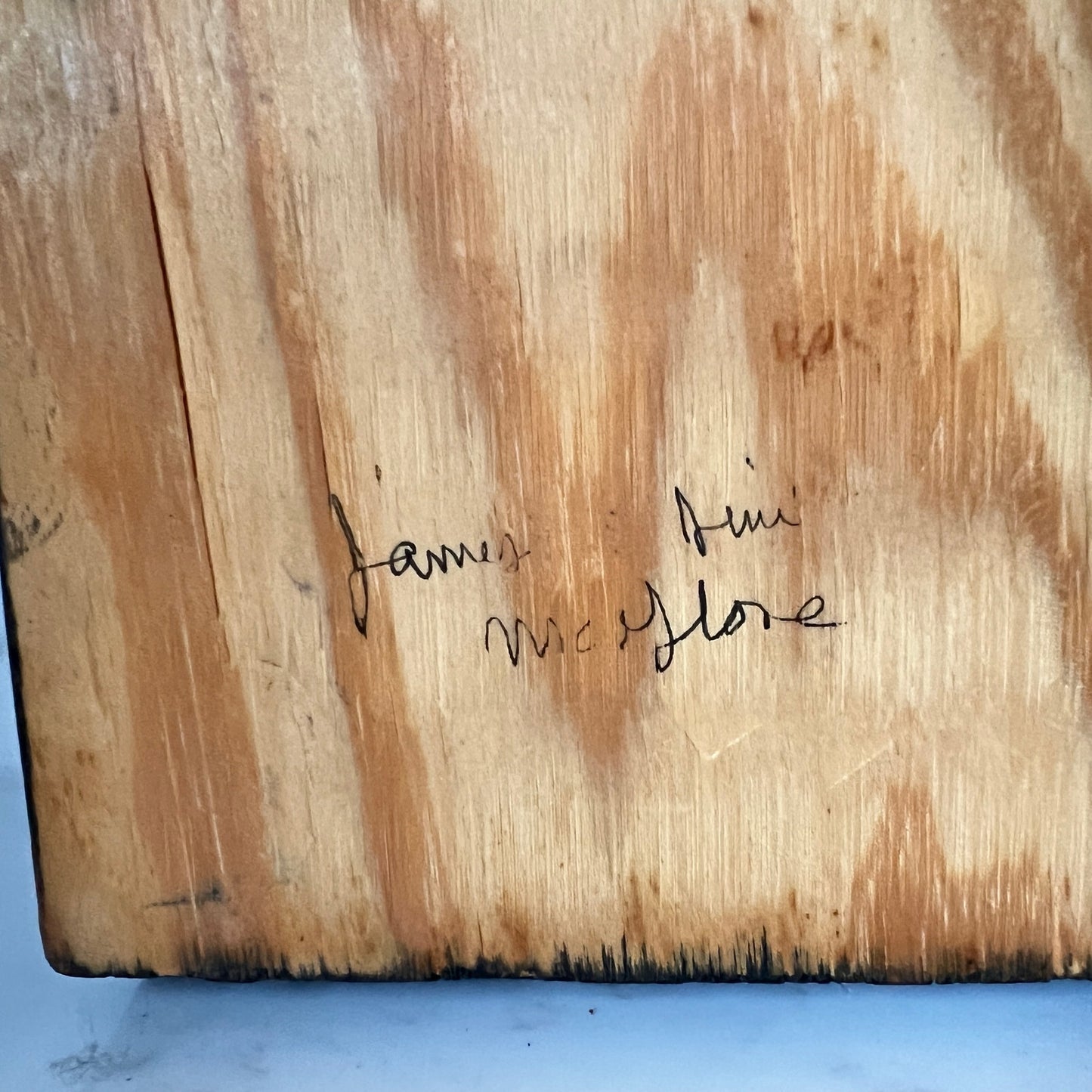 Wooden surface with a signature