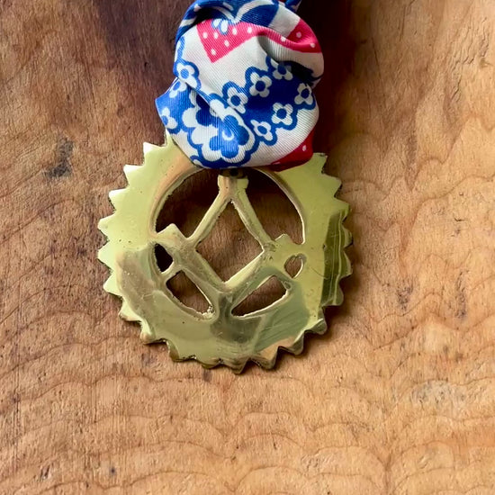 Video Vintage Masonic square and compass brass medallion necklace with red white blue scarf on wood background