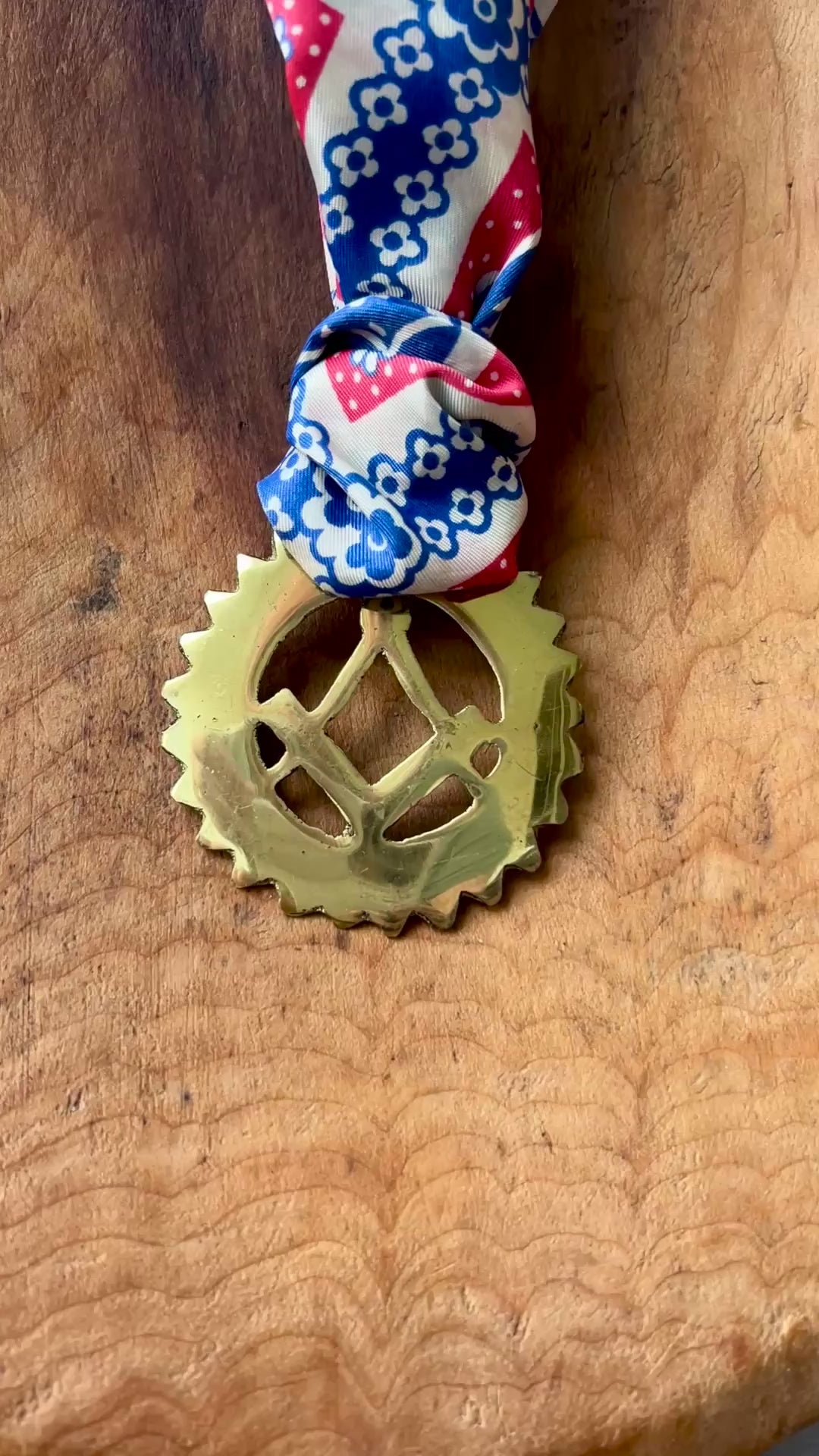 Video Vintage Masonic square and compass brass medallion necklace with red white blue scarf on wood background